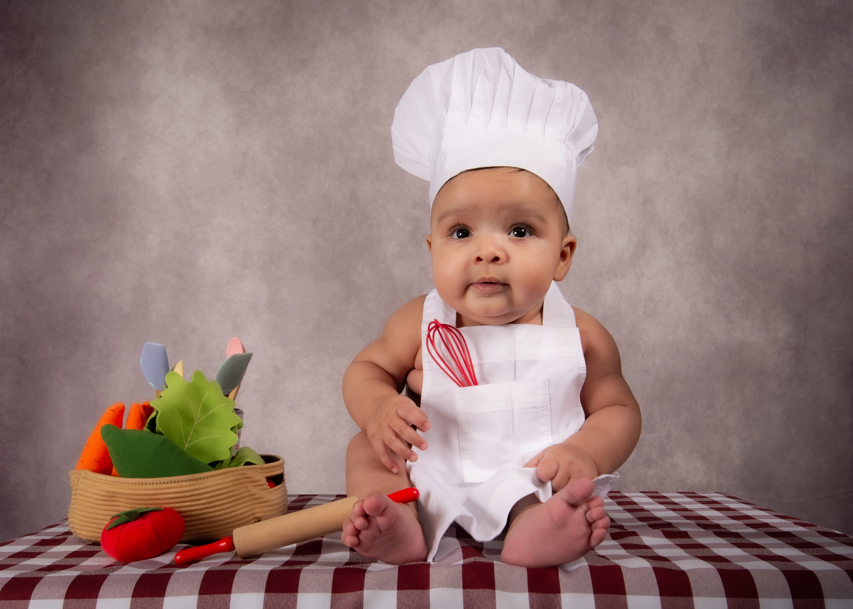 Baby dressed as a chef — Edmonton milestone studio portrait